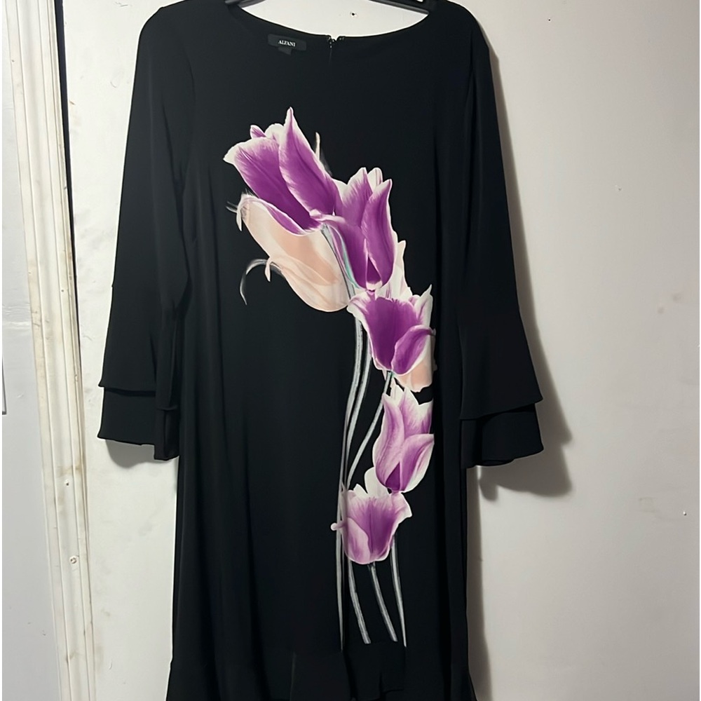Alfani dress with floral design and ruffles on sleeve and bottom